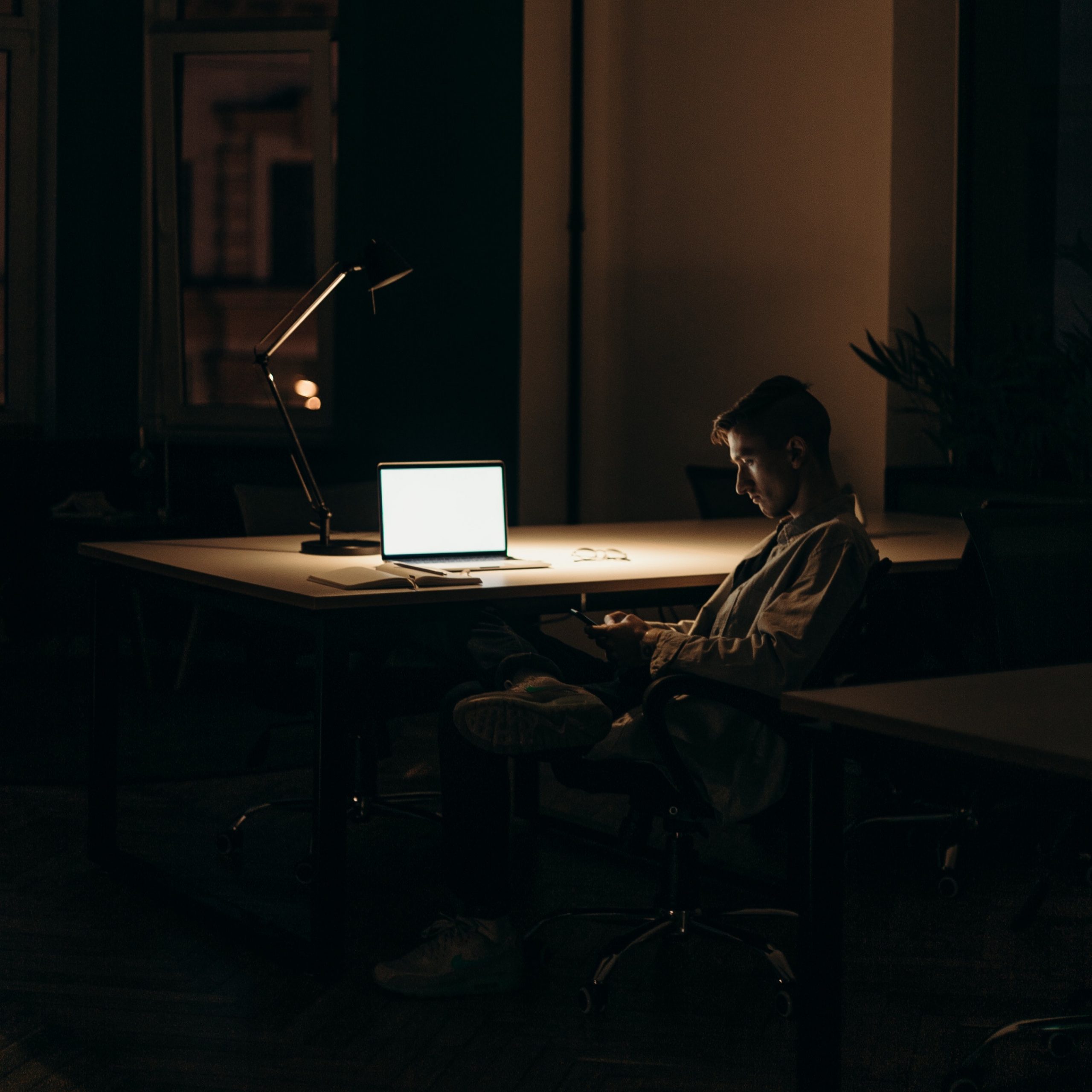 Man in empty dark office