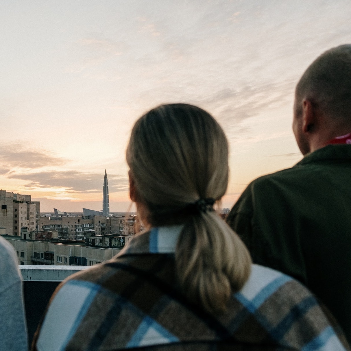 Group of people looking at sunset