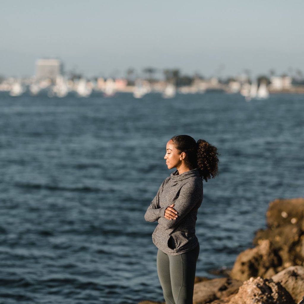 Woman looking out at ocean