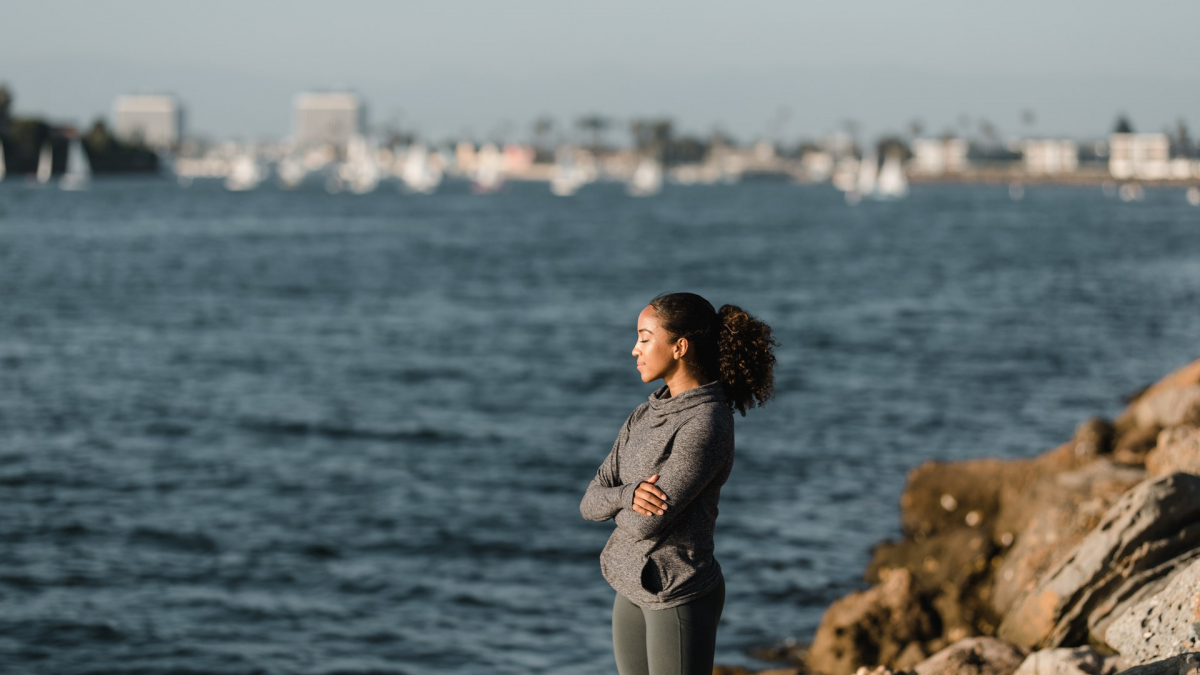 Woman looking out at ocean